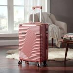 TraveLux Urban közepes bőrönd keményfedeles 68x45x25 cm lazacrózsaszín